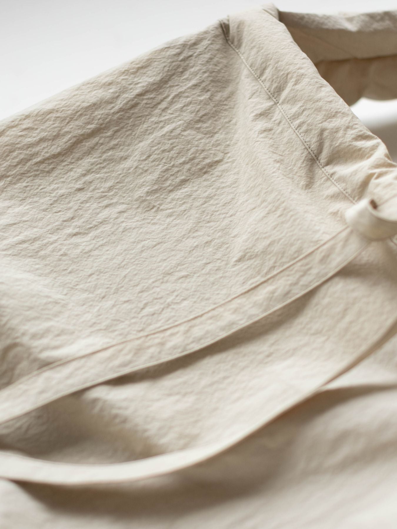 表地は、コットン70%・ナイロン30％の混紡生地を使用。