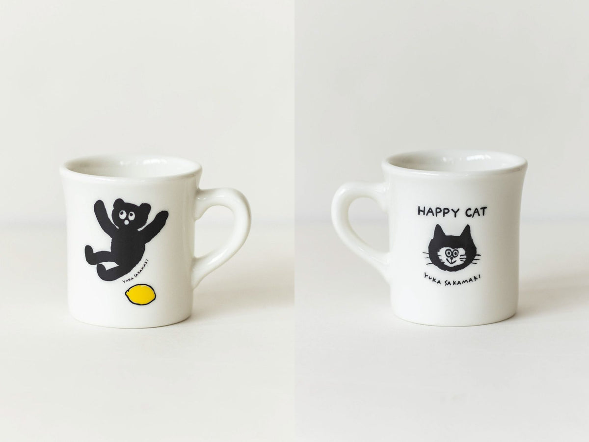 左からフロント面のくま、反対面のHAPPY CAT。