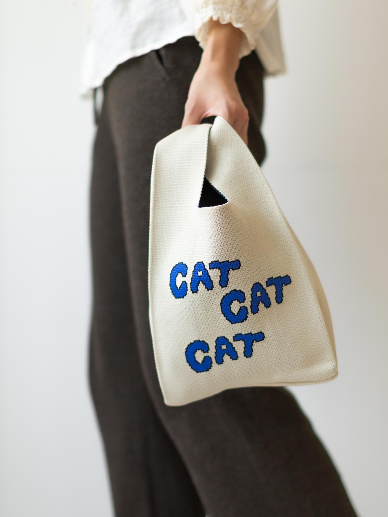 STOMACHACHE. × Orneko ニットミニバッグ