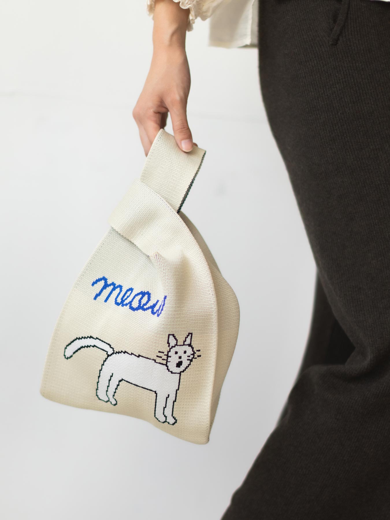 STOMACHACHE. × Orneko ニットミニバッグ