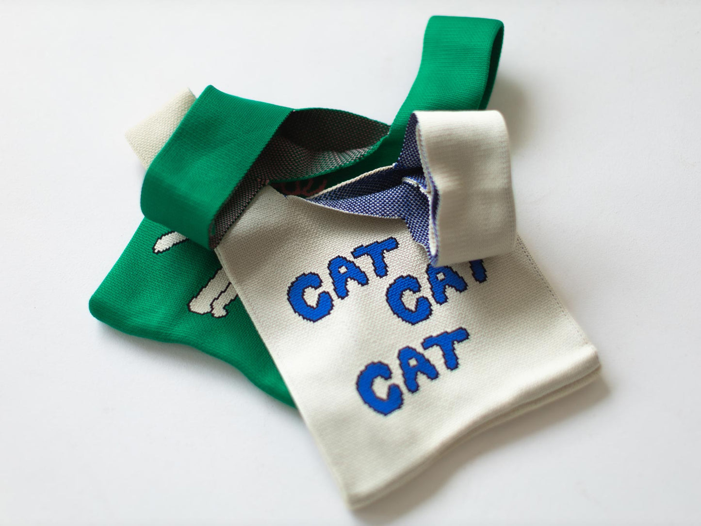 STOMACHACHE. × Orneko ニットミニバッグ